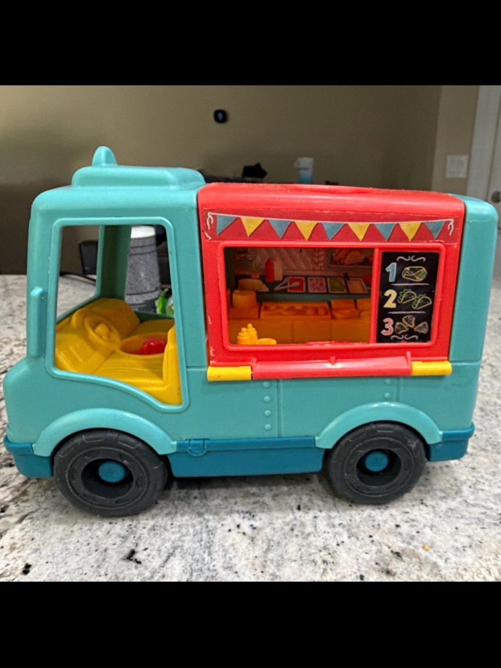 Fisher-Price “Serve It Up” taco Food Truck Toy